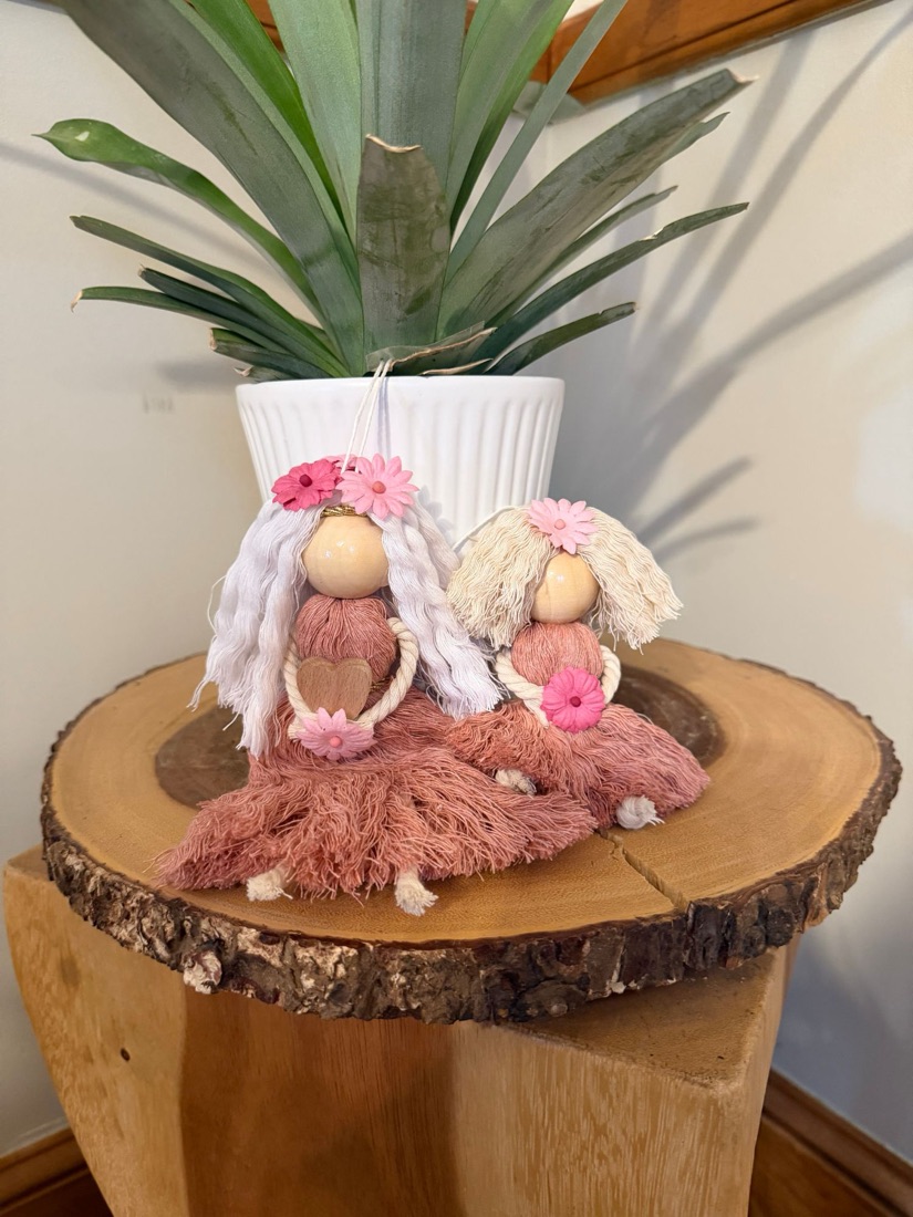 Seated macramé mother and daughter dolls with wooden bead heads